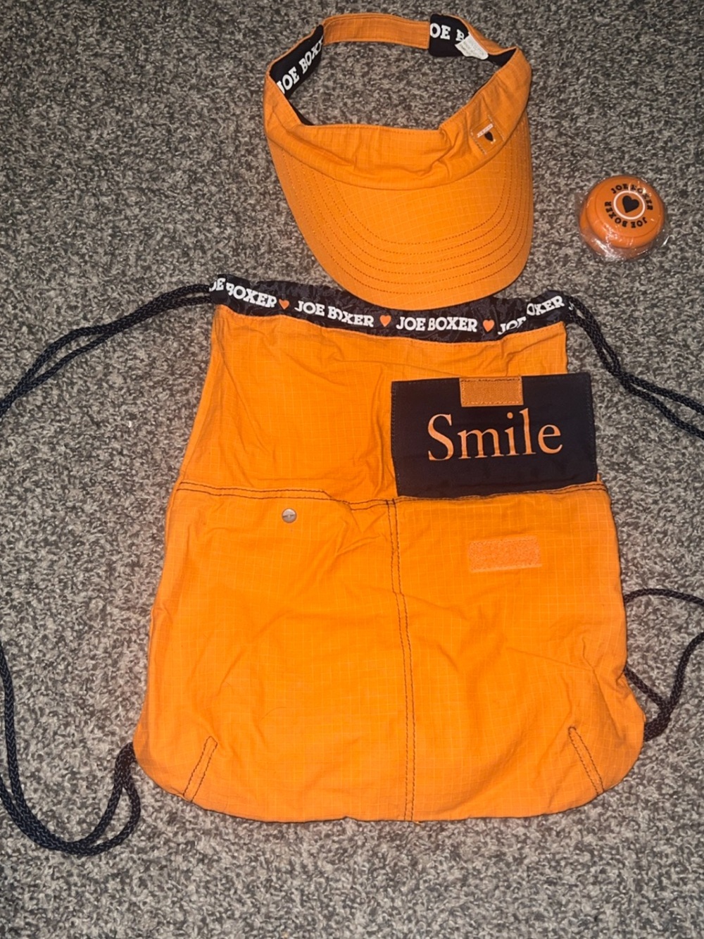 Joe Boxer Orange bag with Matching Visor and yoyo